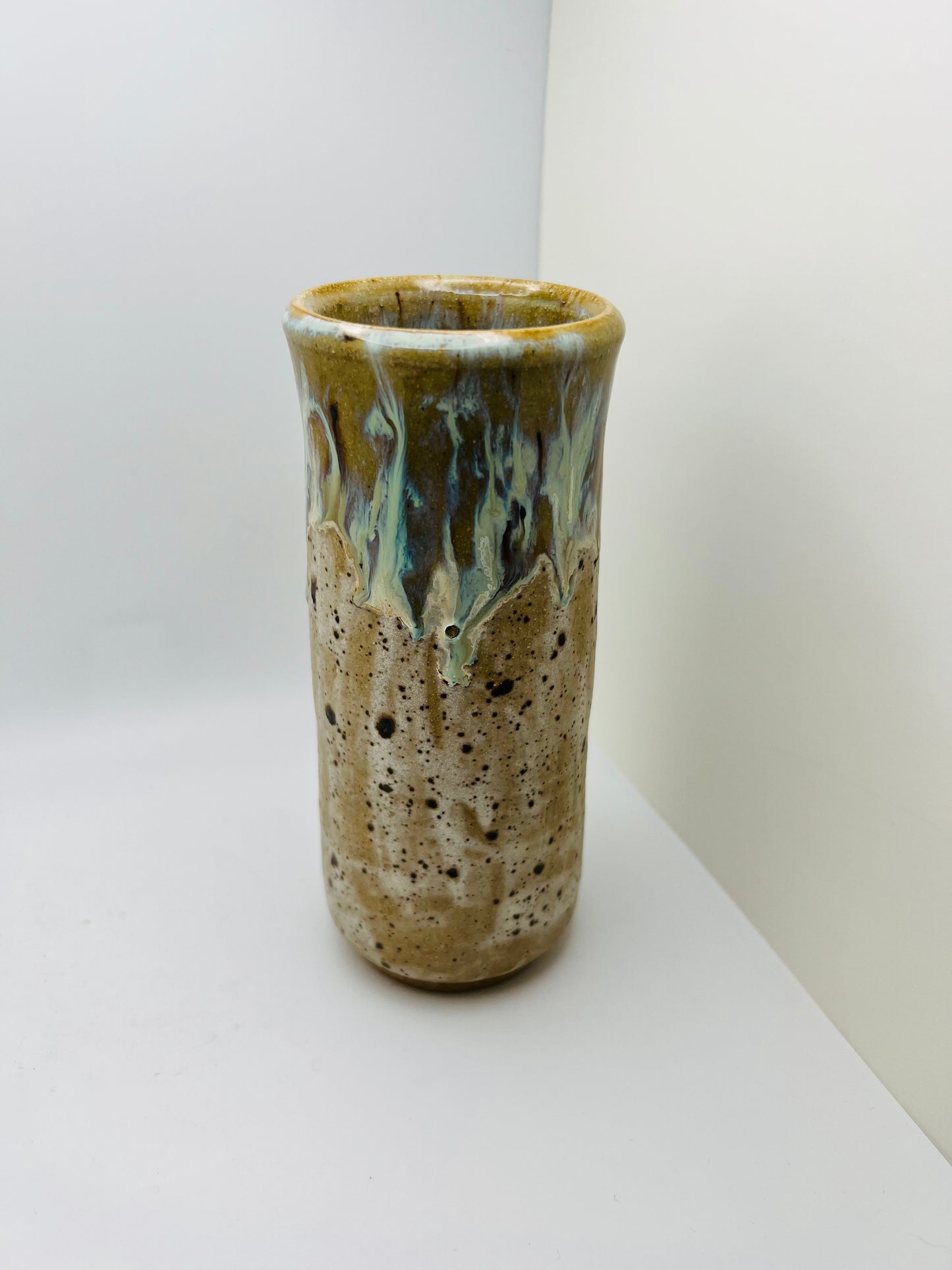 Small white and brown vase